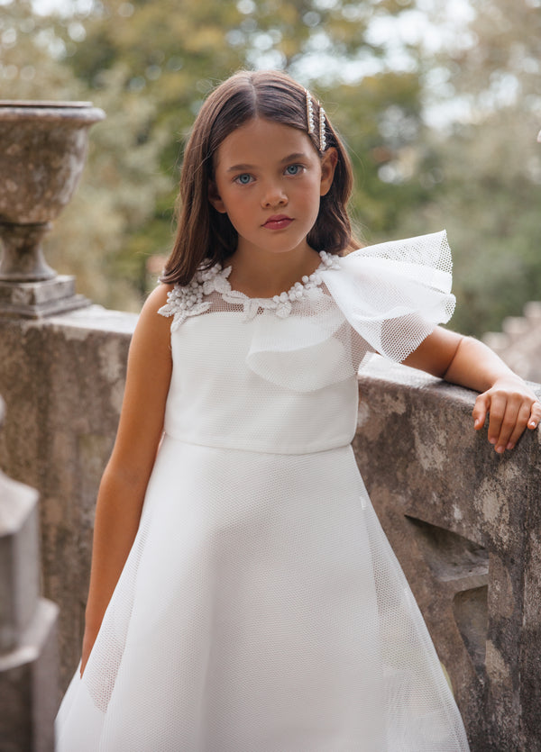 Albertine Beaded Bubble Ruffle Neckline Communion Dress with intricate hand-beaded bodice, made from the finest materials.